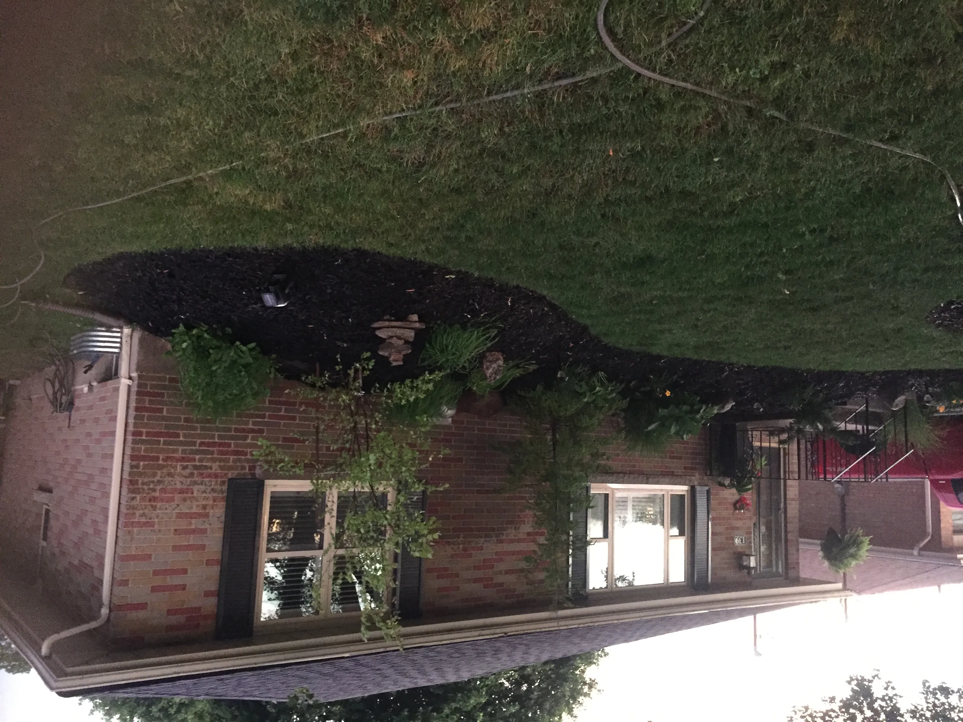 Aerial view of stone entrance pathway and landscaping by Martin Services