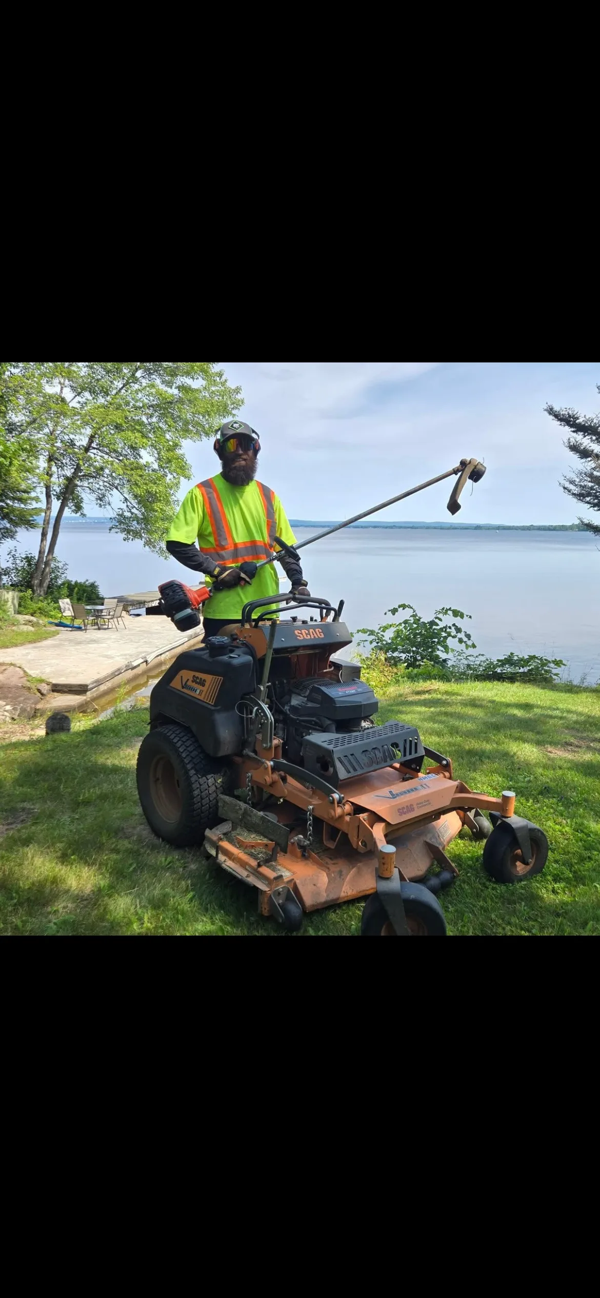 Martin Services providing professional lakefront lawn mowing near Restoule, Ontario