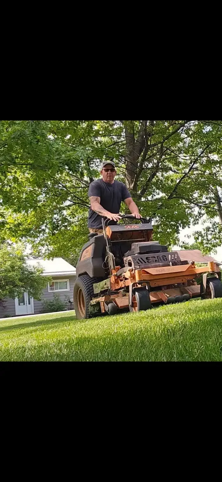 Property maintenance and mowing around trees in Powassan, Ontario